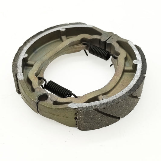 Brake shoe set Drum brake 110x25mm Grooved for Lexmoto, Baotian, Pulse, Rex, Sym